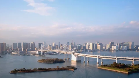 TimeLapse - Tokyo Bay and the view of the city of Tokyo Zoom out Stock Footage 99878118