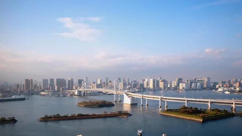 TimeLapse - Tokyo Bay and the view of the city of Tokyo Zoom in Stock Footage 99878134