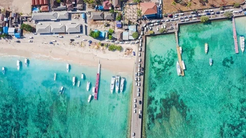 Timelapse Top Down Drone Shot of Cars Entering Nusa Penida Island via Toya Pa Stock Footage 113970331