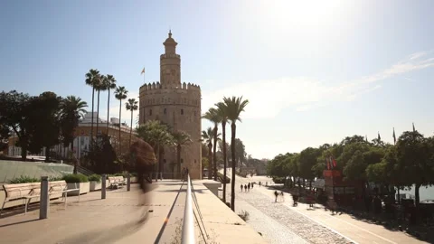 Timelapse of the Torre del Oro in Seville Spain. Walk on the shore of the Gua Stock Footage