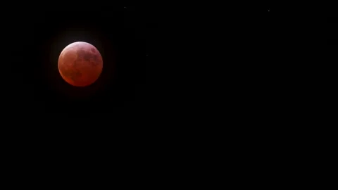 Timelapse of the Total Lunar Eclipse on March 14th, 2025, red blood moon passes Stock Footage 304669349