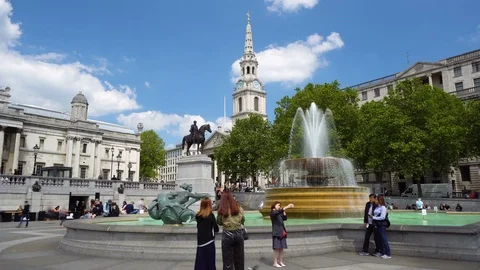 Timelapse of Tourists Posing in Front of Fountain at Trafalgar Square in London, Stock Footage 111408646