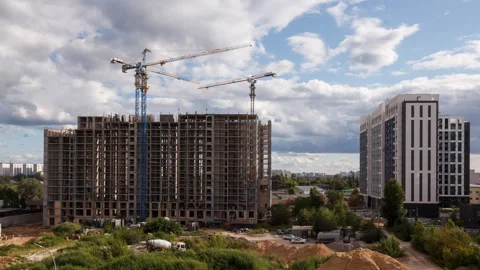Timelapse of tower cranes building residential complex, urban real estate Video stock 316601541