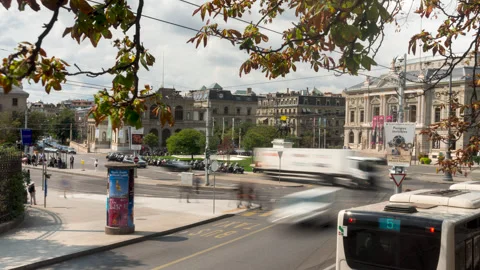 Timelapse of the town square Place de Neuve with blurred car in Geneva Stock Footage 249391236