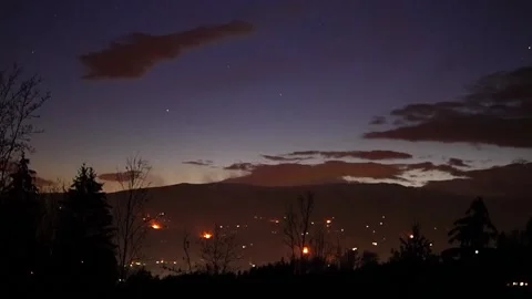 Timelapse of traditional Easter bonfires in spring in Austria Video stock 171390605