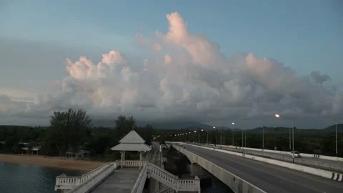 Timelapse traffic and Clouds move over the bridge as the time goes down Stock Footage 205394295