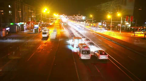 Timelapse of traffic on bridge at night. Blurred motion Stock Footage 30464216