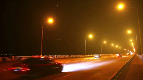 Timelapse of traffic on bridge at night Stock Footage 29457407