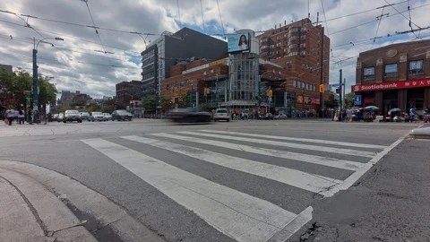 Timelapse of Traffic on Busy city intersection in downtown Toronto, Canada Video stock 121897707
