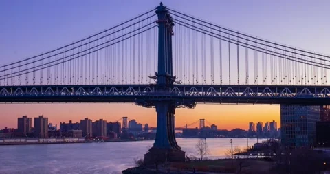 Timelapse of Traffic during sunrise over Manhattan Bridge New York Stock Footage 145998960
