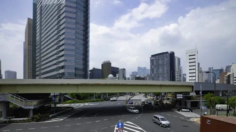 A timelapse of traffic jam at the city crossing in Tokyo wide shot panning Stock Footage 314241680