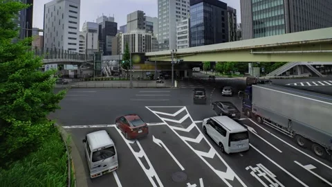 A timelapse of traffic jam at the city crossing in Tokyo wide shot panning Stock Footage 314241728