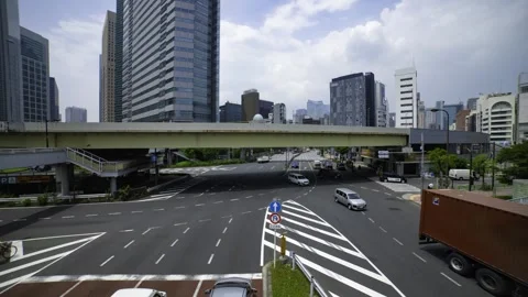 A timelapse of traffic jam at the city crossing in Tokyo wide shot Stock Footage 314241980