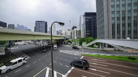 A timelapse of traffic jam at the city crossing in Tokyo wide shot Stock Footage 314242029
