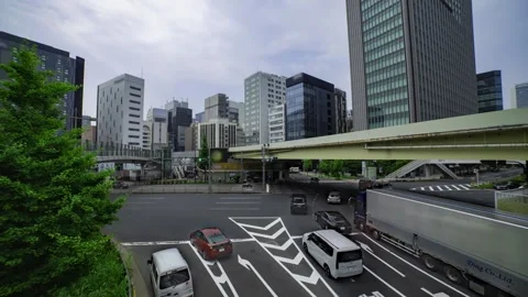 A timelapse of traffic jam at the city crossing in Tokyo wide shot Stock Footage 314242059