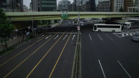 A timelapse of traffic jam at the city crossing in Tokyo wide shot panning Stock Footage 314242092