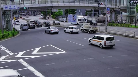 A timelapse of traffic jam at the city crossing in Higashiginza Tokyo zoom Stock Footage 314242176