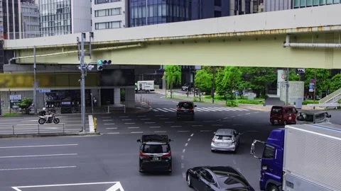 A timelapse of traffic jam at the city crossing in Higashiginza Tokyo zoom Stock Footage 314242202