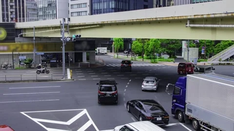 A timelapse of traffic jam at the city crossing in Higashiginza Tokyo tilt Stock Footage 314242210