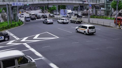 A timelapse of traffic jam at the city crossing in Higashiginza Tokyo tilt Stock Footage 314242217