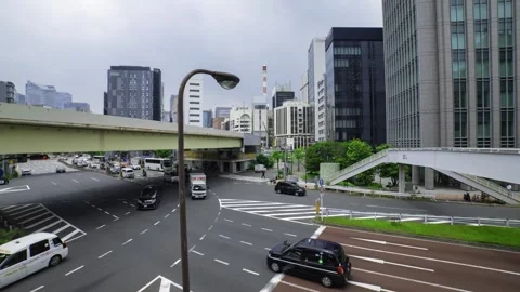 A timelapse of traffic jam at the city crossing in Tokyo wide shot zoom Stock Footage 314242258