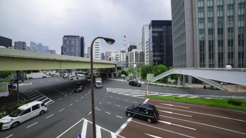 A timelapse of traffic jam at the city crossing in Tokyo wide shot tilt Stock Footage 314242272