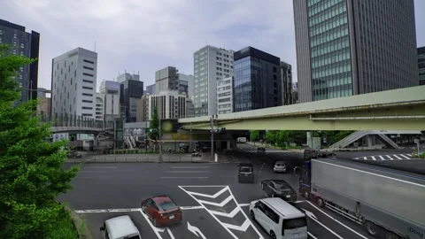 A timelapse of traffic jam at the city crossing in Tokyo wide shot zoom Stock Footage 314242307