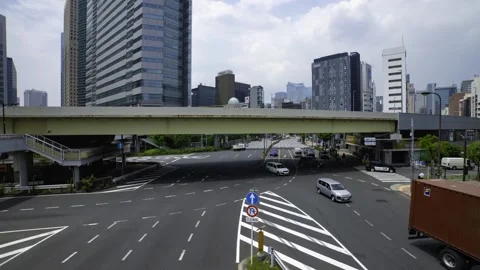 A timelapse of traffic jam at the city crossing in Tokyo wide shot zoom Stock Footage 314242320