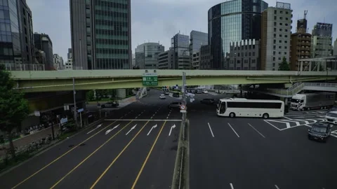 A timelapse of traffic jam at the city crossing in Tokyo wide shot zoom Stock Footage 314242330