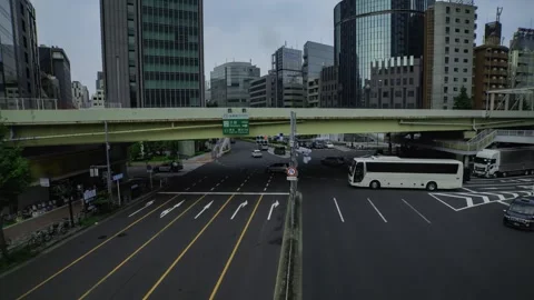 A timelapse of traffic jam at the city crossing in Tokyo wide shot zoom Stock Footage 314242348