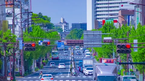 A timelapse of traffic jam at the downtown avenue daytime zoom Stock Footage