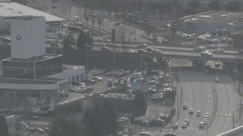 Timelapse of traffic at light and freeway bridge from high above Stock Footage 127048833