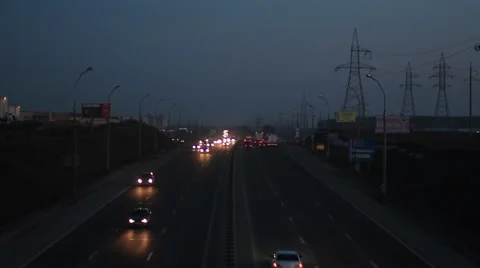 Timelapse, traffic machines at dusk Stock Footage 47872385