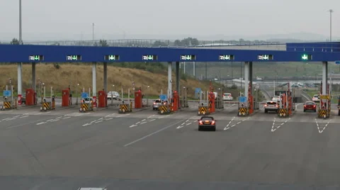 Timelapse of traffic passing through toll booths, Tyne Tunnel, Newcastle. Video stock 68571463