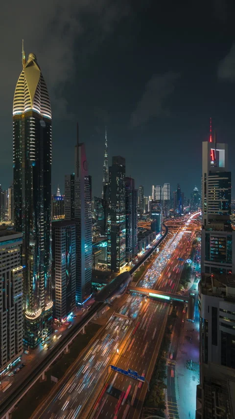 Timelapse of Traffic on Sheikh Zayed Road at Night in Dubai, UAE, Zoom In Stock Footage 285794727