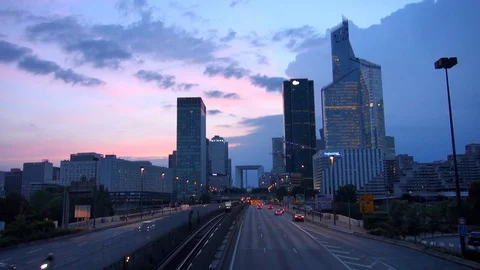 Timelapse train and car traffic in Paris La Defense modern area icon at twilight Stock Footage 84735797