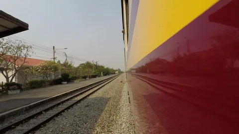 Timelapse of Train Driving Through Thailand Countryside Stock Footage 127916758