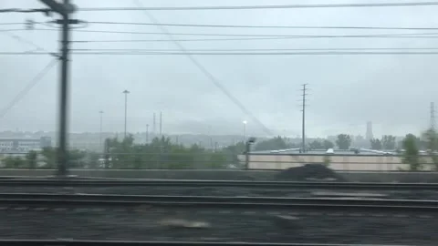 TIMELAPSE | Train moving through New York City suburbs on a rainy autumn day Stock Footage 317291422