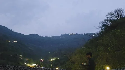 Timelapse of tree covered Himalaya mountain hills with monsoon clouds overhead Stock Footage 337665949