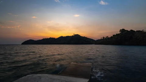 Timelapse of a tree standing at a sandy beach on Koh Chang, Trad, Thailand Stock Footage 263025770