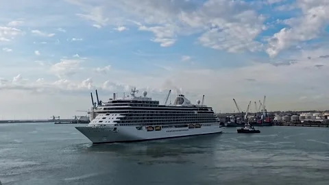 Timelapse of Tugboat Assisting Ship Maneuver in Port of Cartagena Spain Stock Footage 335881384