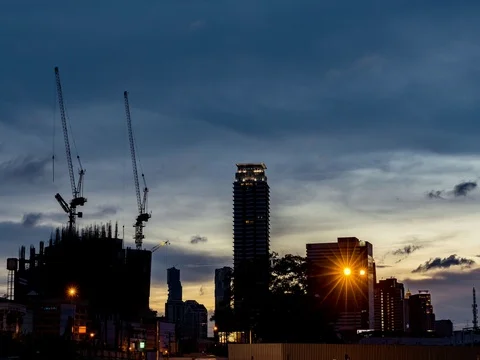 Timelapse Twilight. Silhouette construction is high building at twilight. Stock Footage 80921117