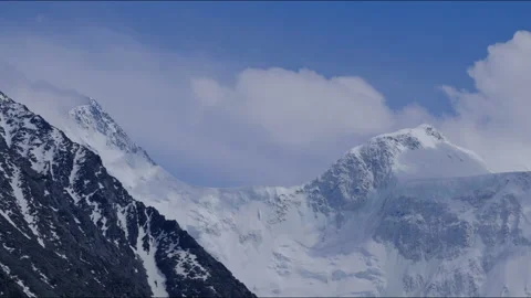 Timelapse of the two peaks of the Russian mountain Belukha in the clouds Stock-Footage 170071256