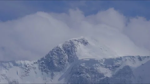 Timelapse of the two peaks of the Russian mountain Belukha in the clouds Stock-Footage 170663045