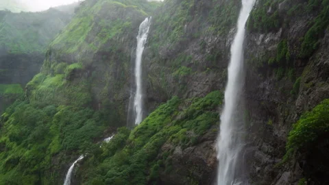 Timelapse - Two waterfalls in one frame in a mountain 4K60 Stock Footage 268973888
