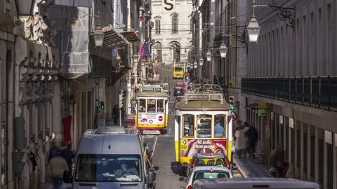 Timelapse of typical Lisbon street view with tramways and car traffic. Portugal Stock Footage