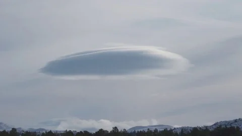 Timelapse of UFO-shaped cloud Stock Footage 81455049