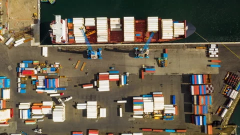 Timelapse of unloading a container ship in the port, Aerial view Stock Footage 167888787