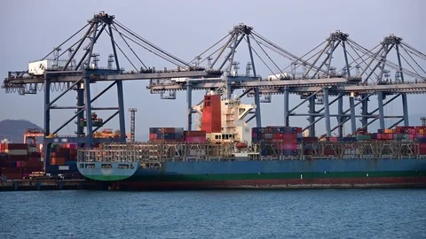 Timelapse unloading containers of cargo ship Stock Footage 125559747