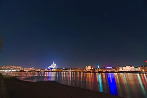 Timelapse of urban star trailing over urban skyline Cologne Cathedral 8k Stock Footage 104254043